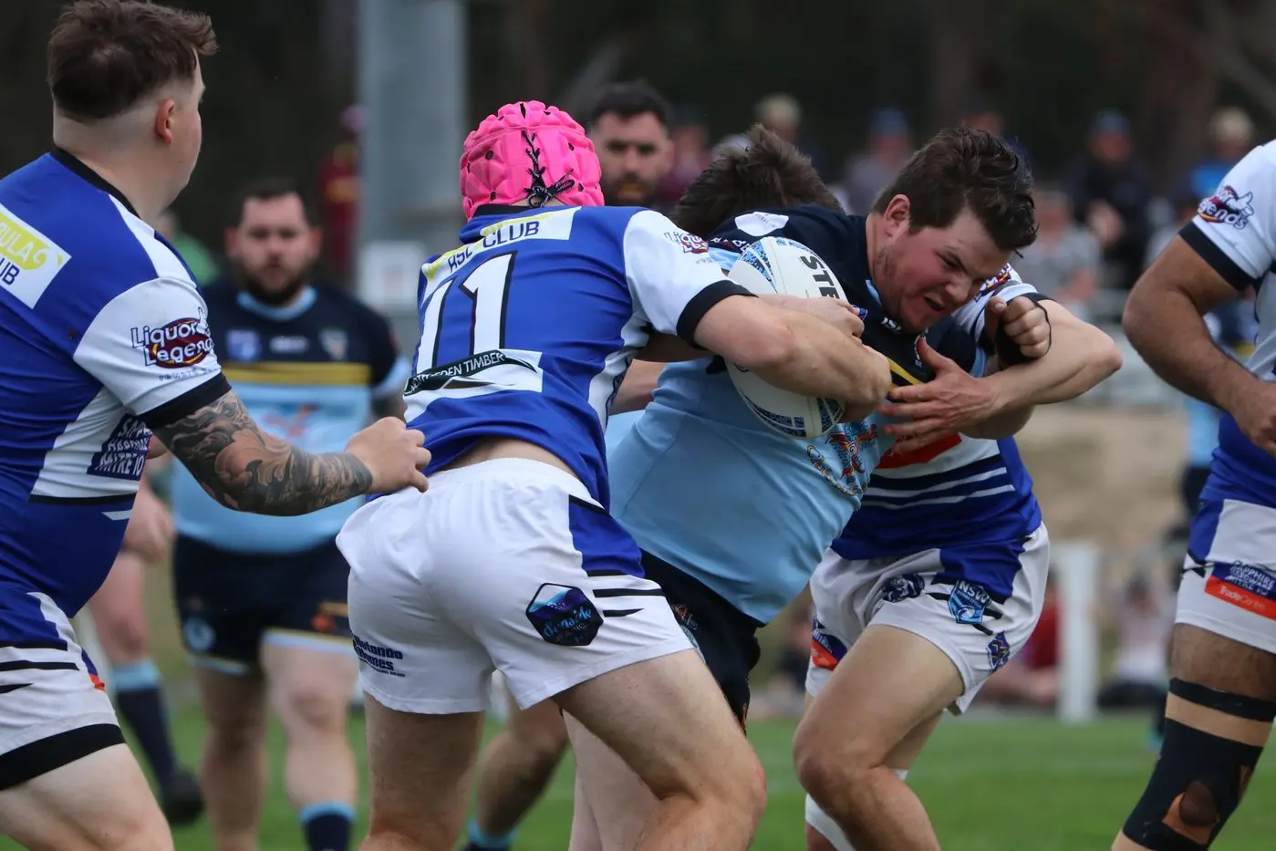 WORKING HARD: Bombala Blue Heelers forward, Baidon Sten, charges into the Merimbula-Bulldogs defence. PHOTOS: Nathan Thompson