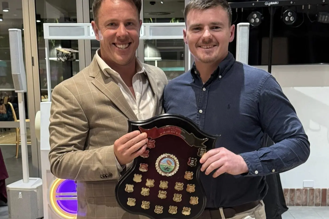 HONOUR: The Queanbeyan Kangaroos first grade best and fairest award goes to Jesse Dent (right) who has a strong Bombala connection. He is presented the award by his captain/coach, Sam Williams, who has a strong Cooma connection. PHOTOS: Queanbeyan Kangaroos