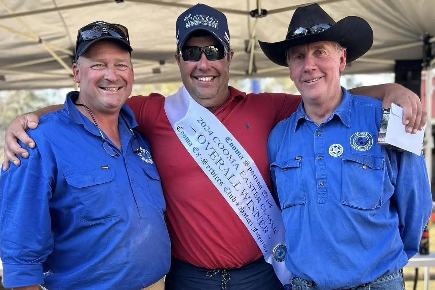 ON TARGET: Stephen Cooper (middle) celebrates winning the 41st Cooma Sporting Clays Easter Classic. Cooper is congratulated by Cooma Sporting Clays secretary Adam Mower and president Andrew Fairfield-Smith. PHOTO: Cooma Sporting Clays.