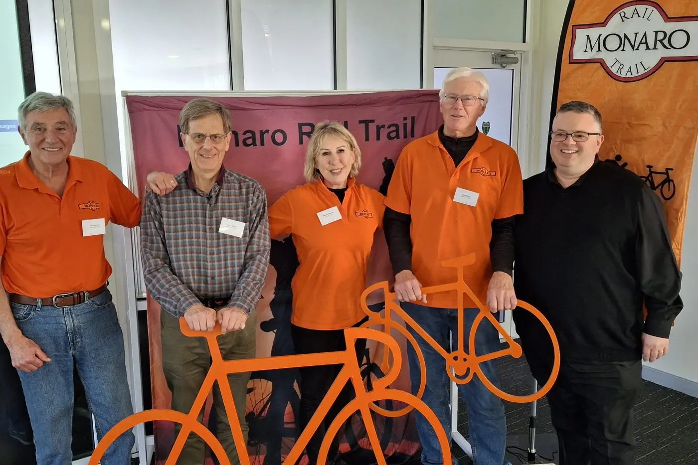SUPPORT: Monaro Rail Trail organisation members (from left) Peter Coumbis, Frank Bakker, Rosanne Coumbis, Dave Byrne with Ryan Deebank, QPRC economic development officer at a forum into rail trails last year. The MRT has welcomed council\\'s support of re-investigating the project\\'s viability. PHOTO: Supplied