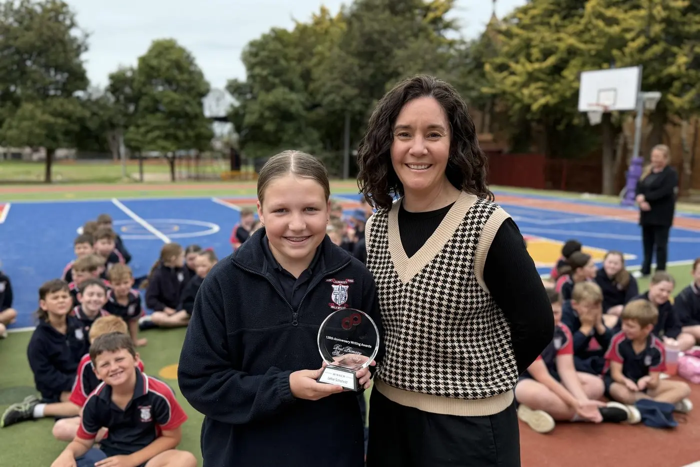 TOP WRITER: Lettie Schofield of St Laurence\\u2019s Parish School, Forbes, won the Primary Student category of the Country Press NSW Inc 125th Anniversary Writing Awards. She was encouraged to enter by her teacher, Carmen Spry. PHOTO: Forbes Advocate