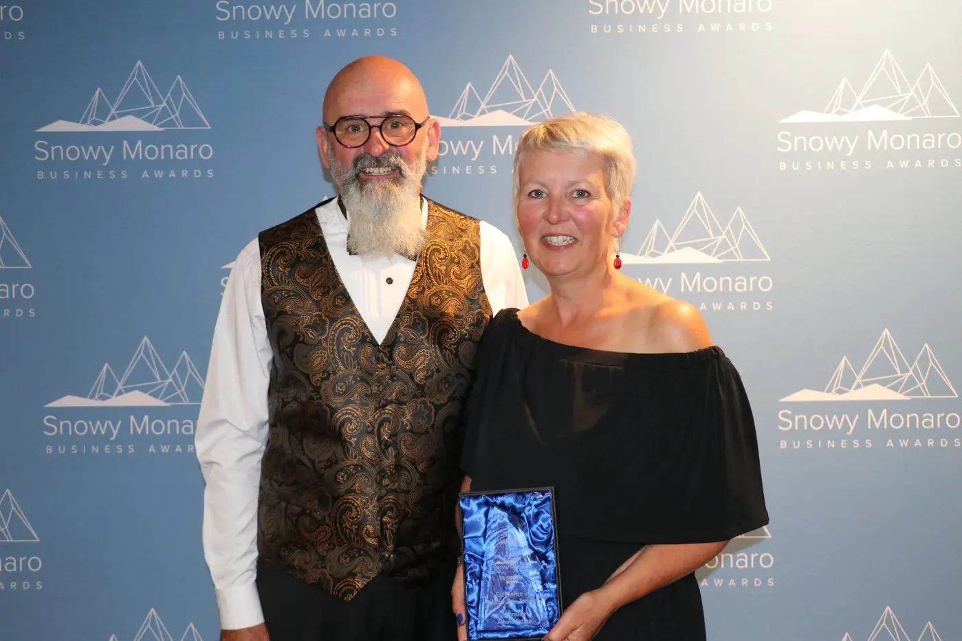 WINNERS: Oliver and Jacquie Kapetanakos of Avonside Alpine Estate are all smiles after claiming the Snowy Monaro\\'s best business for sustainable tourism. PHOTO: Nathan Thompson