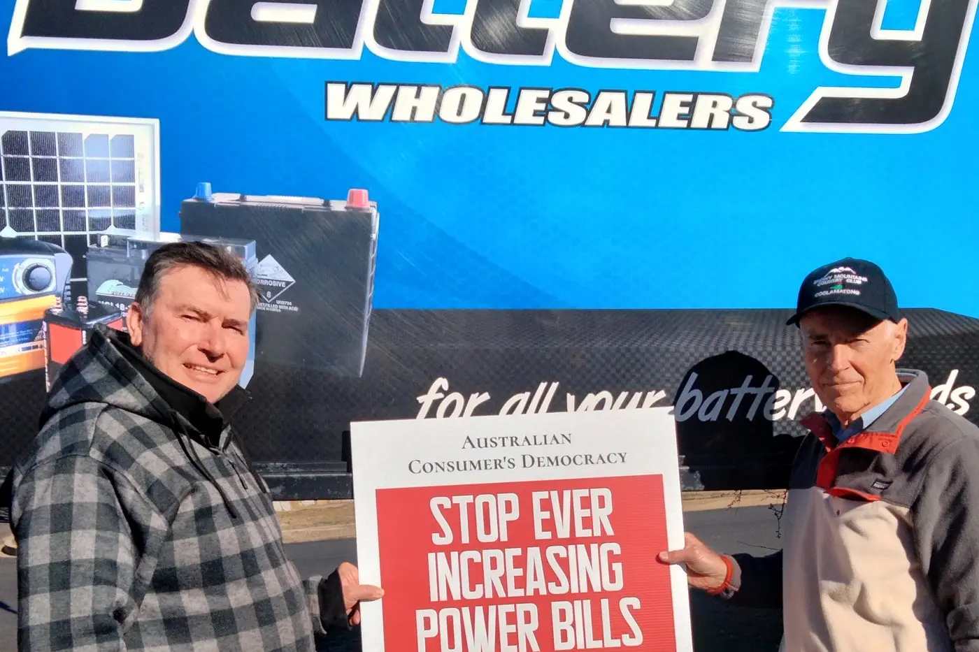 FAIR GO: Cooma business owner, Tim Fitzgerald, (left), has joined a local movement calling on energy companies to lower bills and move away from net zero. Mr Fitzgerald is with Roger Selis of the Australian Consumers\\' Democracy. PHOTO: Supplied
