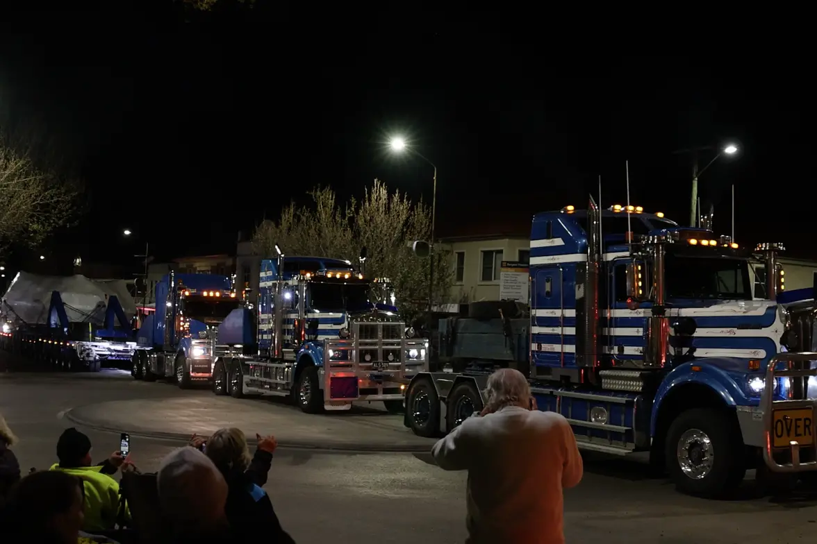 BIG HAUL: One of the largest Snowy 2.0 truck movements passes through Cooma. Hundreds of locals turned out to watch the 450 tonne movement head through town at close to midnight. PHOTO: Snowy Hydro