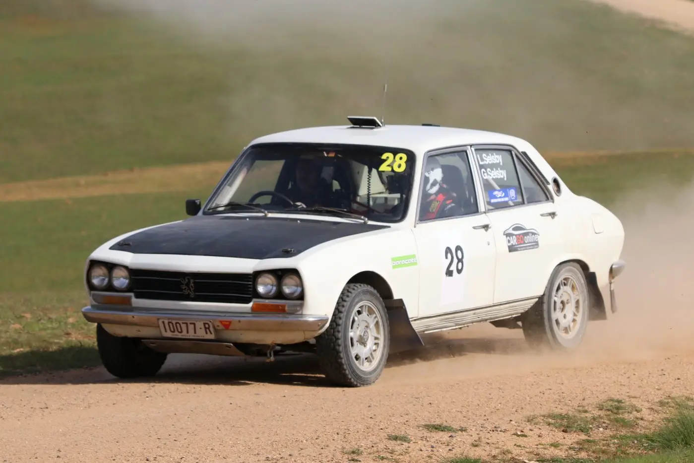 Greg Seisby and Barry Smec zip by onlookers at the Ando spectator point for the rally.\\nPHOTOS: Nathan Thompson