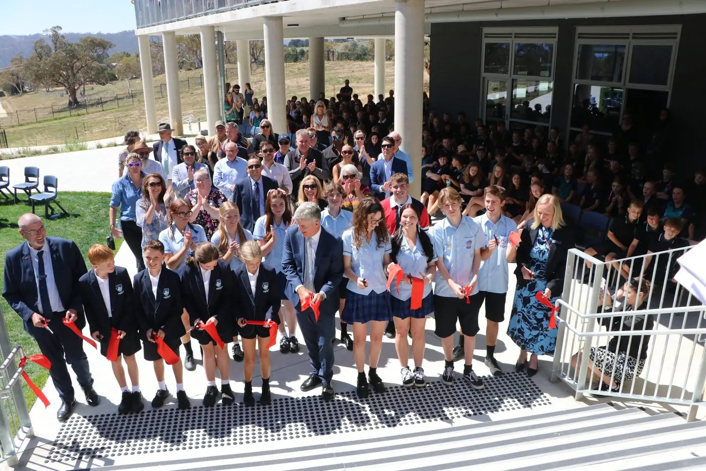CELEBRATE: Member for Monaro, Steve Whan, joined Jindabyne Public School Principal, Steve J McAlister, and High School Principal, Kelly Henretty, and students for a ribbon cutting ceremony. PHOTOS: Trista Heath