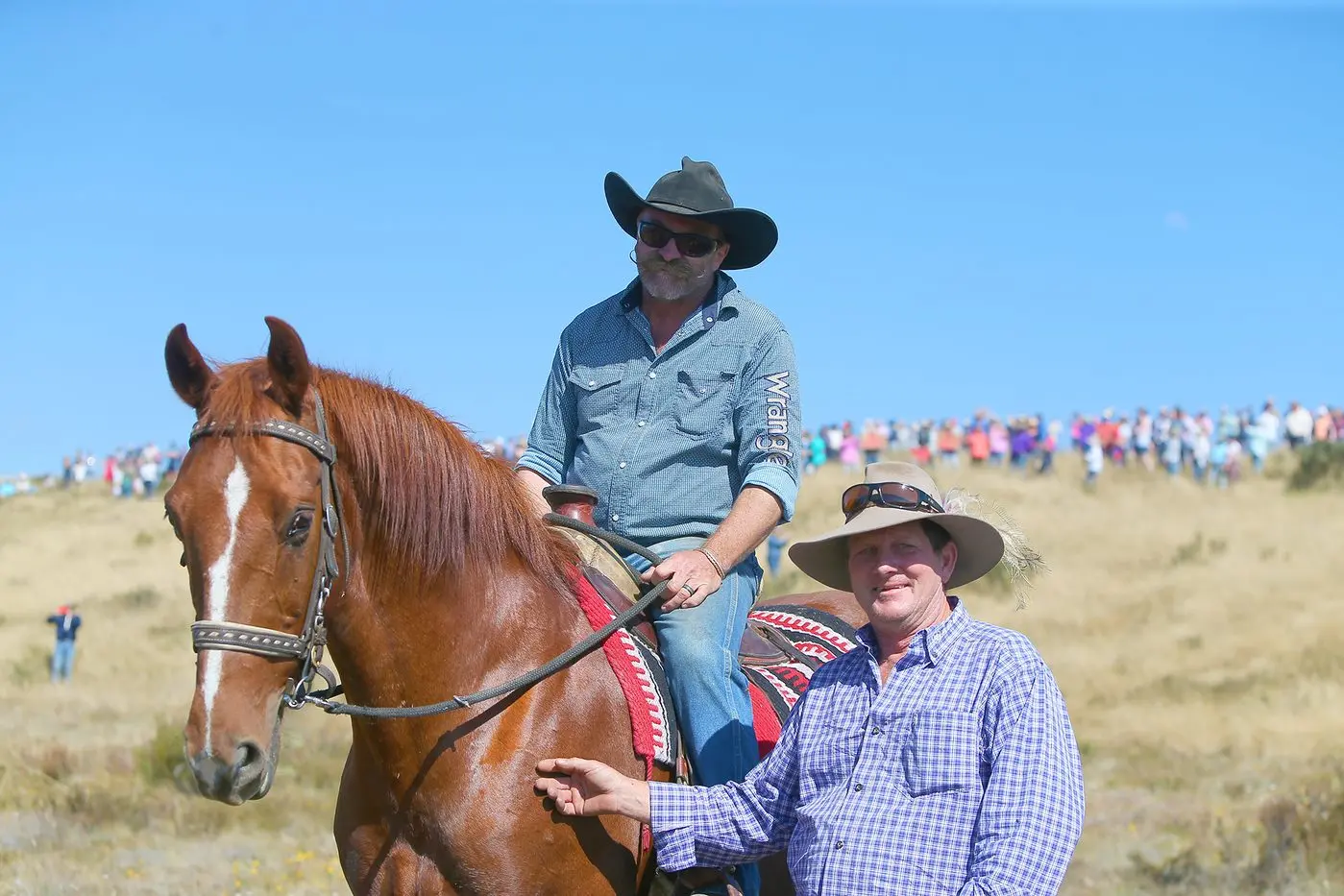 OPPOSITION: Rocky Harvey and Dean Marsland attend the rally on Easter Sunday at Long Plain to oppose the park closure and Brumby cull. PHOTO: Jen Sol Photography