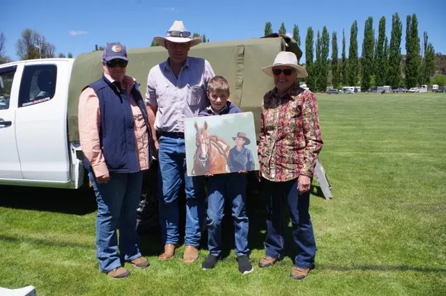 TRIBUTE: Michelle Brown presented a portrait of the late Michelle O\\u2019Neill and horse Squiggles to Michelle\\u2019s partner Warren Schofield, son Spencer and mother Neroli O\\u2019Neill. PHOTO: Gail Eastaway