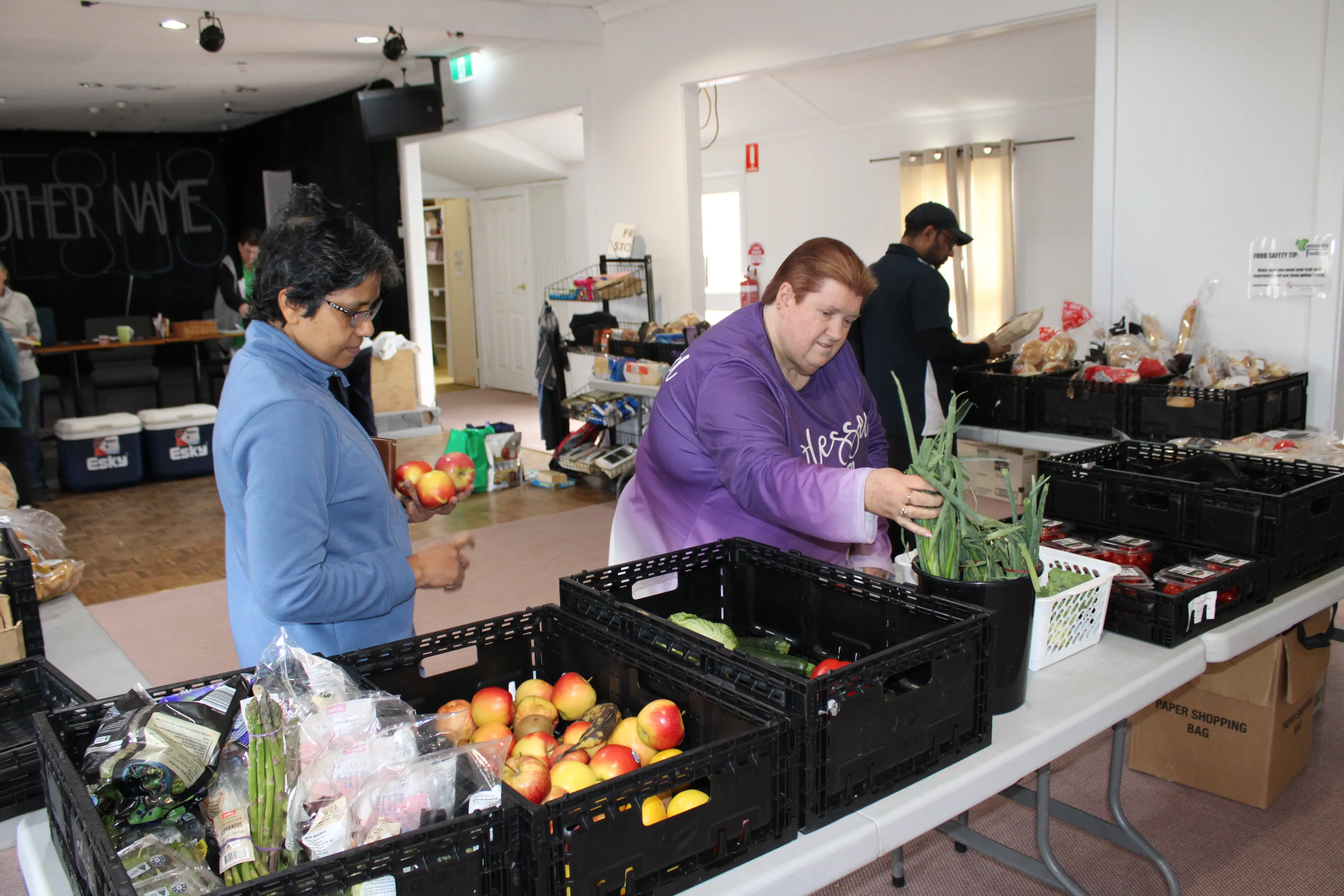 <p>SUPPORT: Customers Kusumam Wilson (left) and Kylie Rootsey and Binu Blacidus browse the food items available from Lifegate Christian Church\\'s Foodcare shop in Yulin Avenue, Cooma. PHOTO: Melinda Cairns Hack </p>\\n
