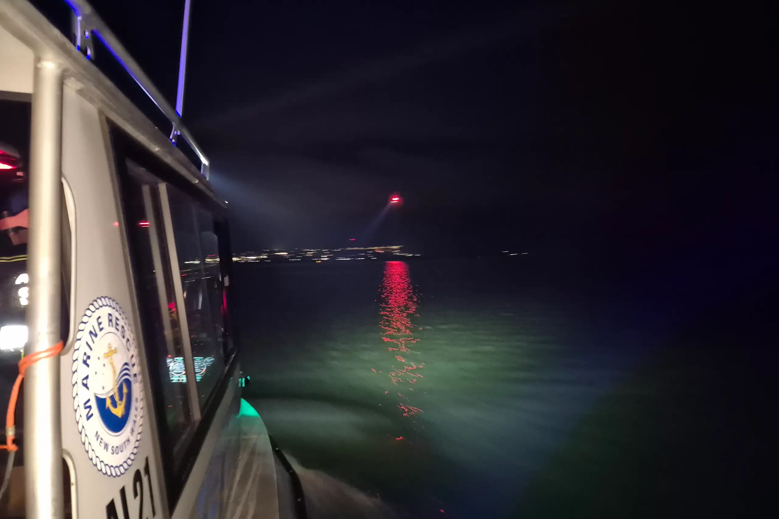 <p>HELP: Marine Rescue Alpine Lakes volunteers have rescued three people following a search and rescue mission on Lake Jindabyne on Wednesday night. PHOTO: Marine Rescue NSW</p>\\n