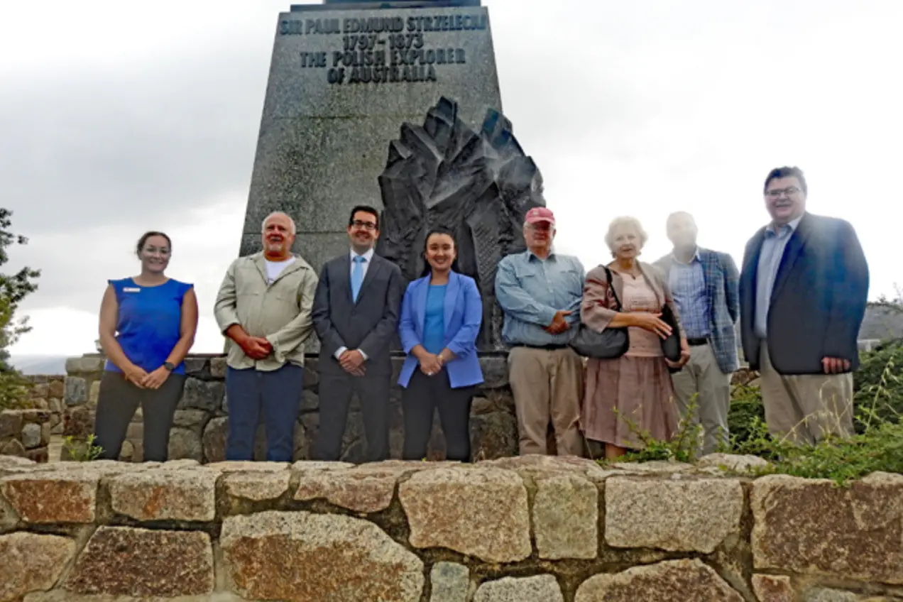 <p>MEET: Council representatives, Department of Regional Development representatives and Kosciuszko Heritage Inc representatives in front of the Sir Paul Edmund Strzelecki monument in Jindabyne. PHOTO: Supplied</p>\\n