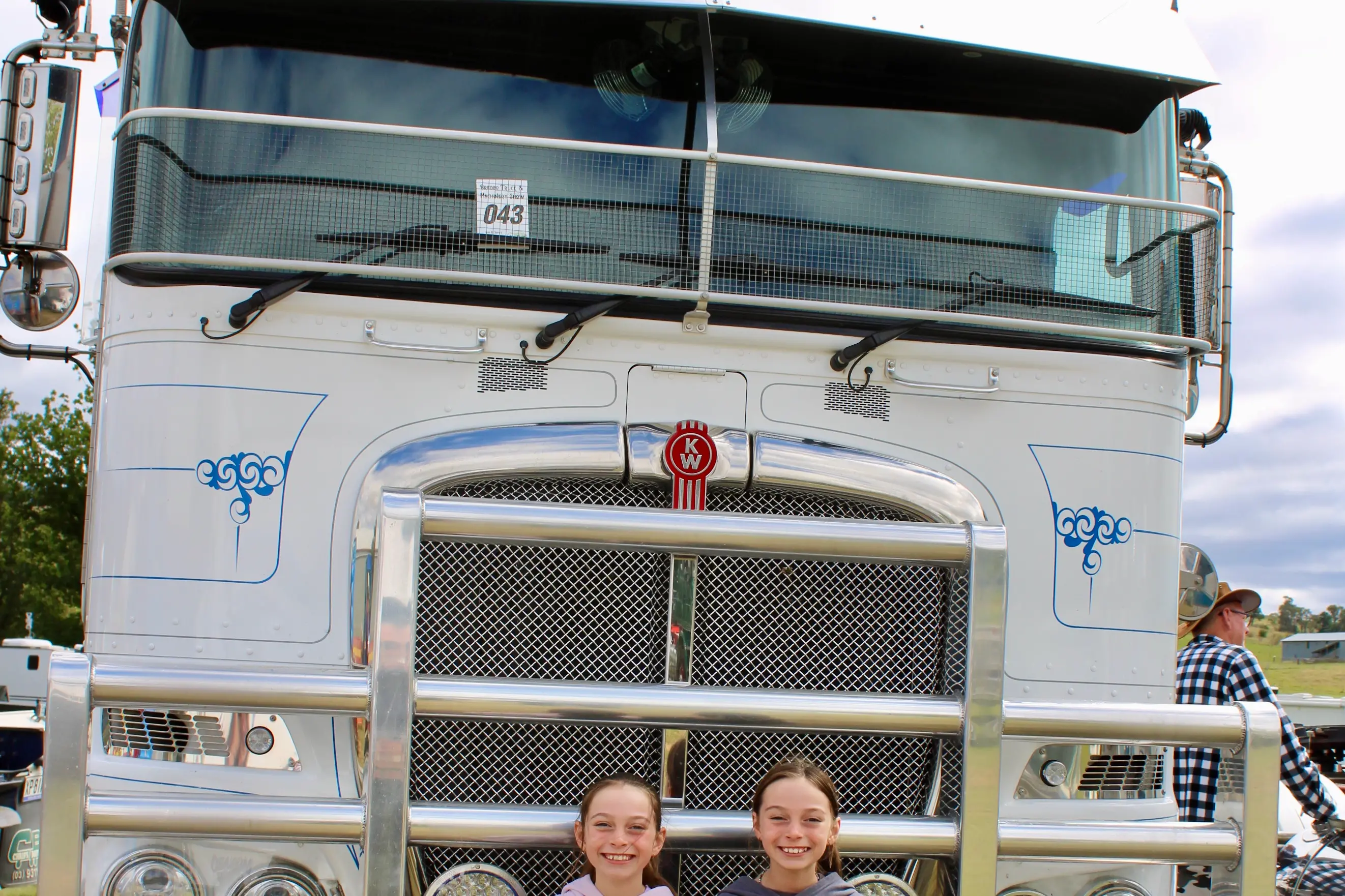 <p>BIG RIGS: Rory and Chevy Downs of Cooma enjoy checking out the display of trucks at the Bredbo Truck and Machinery Show. PHOTO: Melinda Cairns Hack</p>\\n