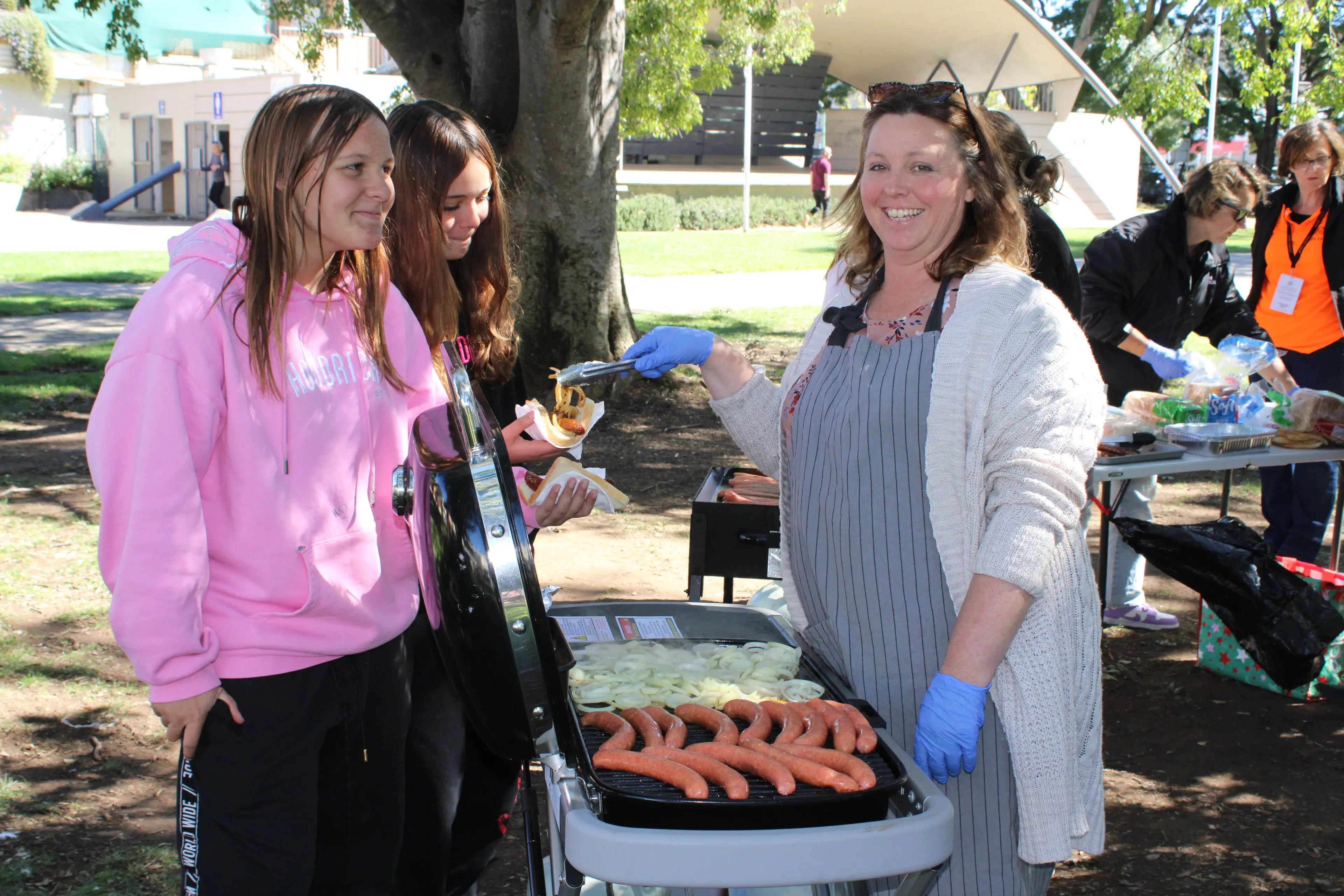 <p>SUPPORT: A free sausage sizzle was held in Centennial Park, Cooma, recently to mark Youth Homelessness Awareness Day. Pictured is Jodie Reed (right) from MCAS. PHOTO: Melinda Cairns Hack</p>\\n