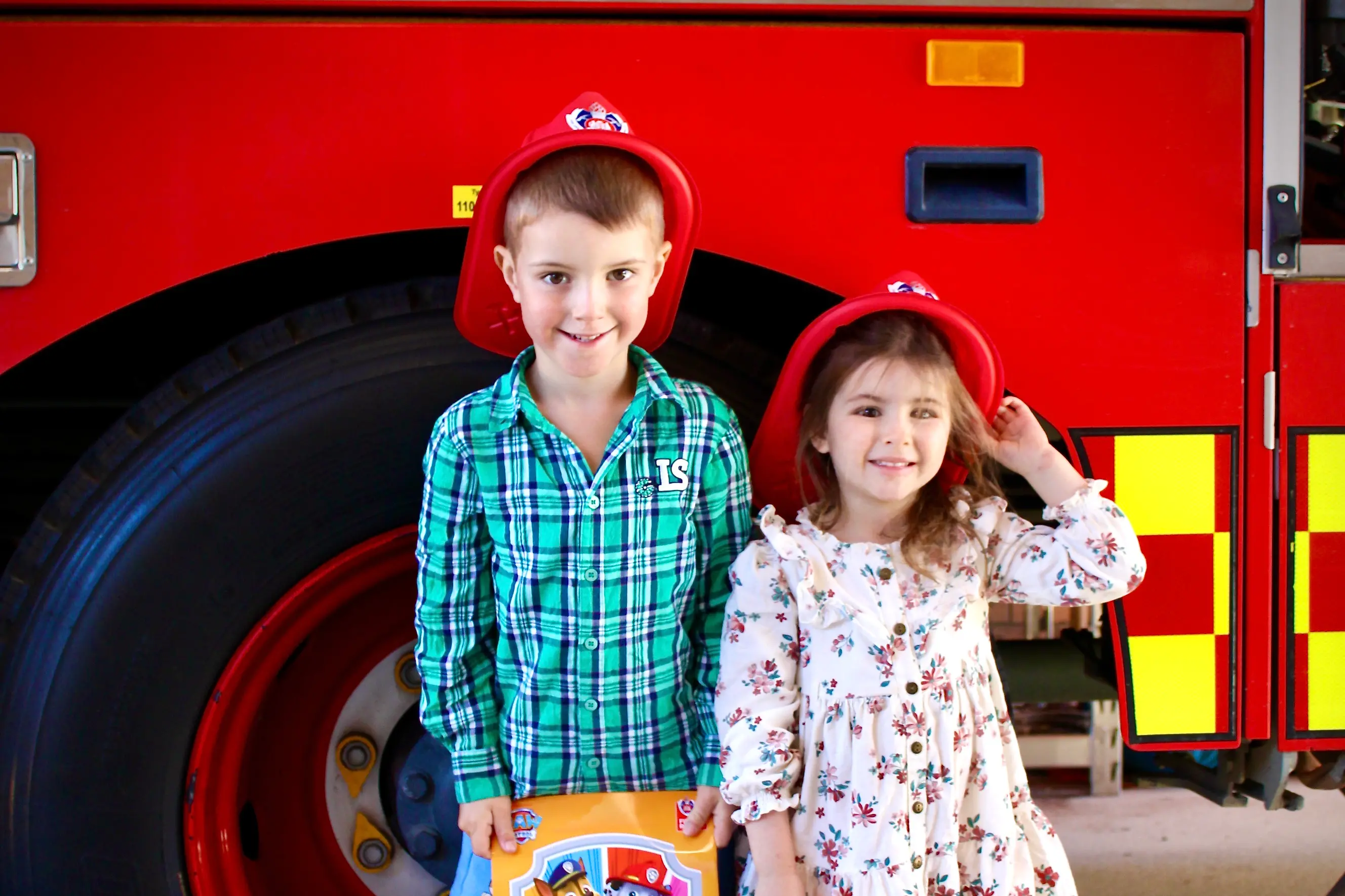 <p>INTERACTION: Jasper and Maisie of Cooma took a tour around the Massie Street Cooma Fire and Rescue station on 9 May during the open day. PHOTO: Melinda Cairns Hack</p>\\n