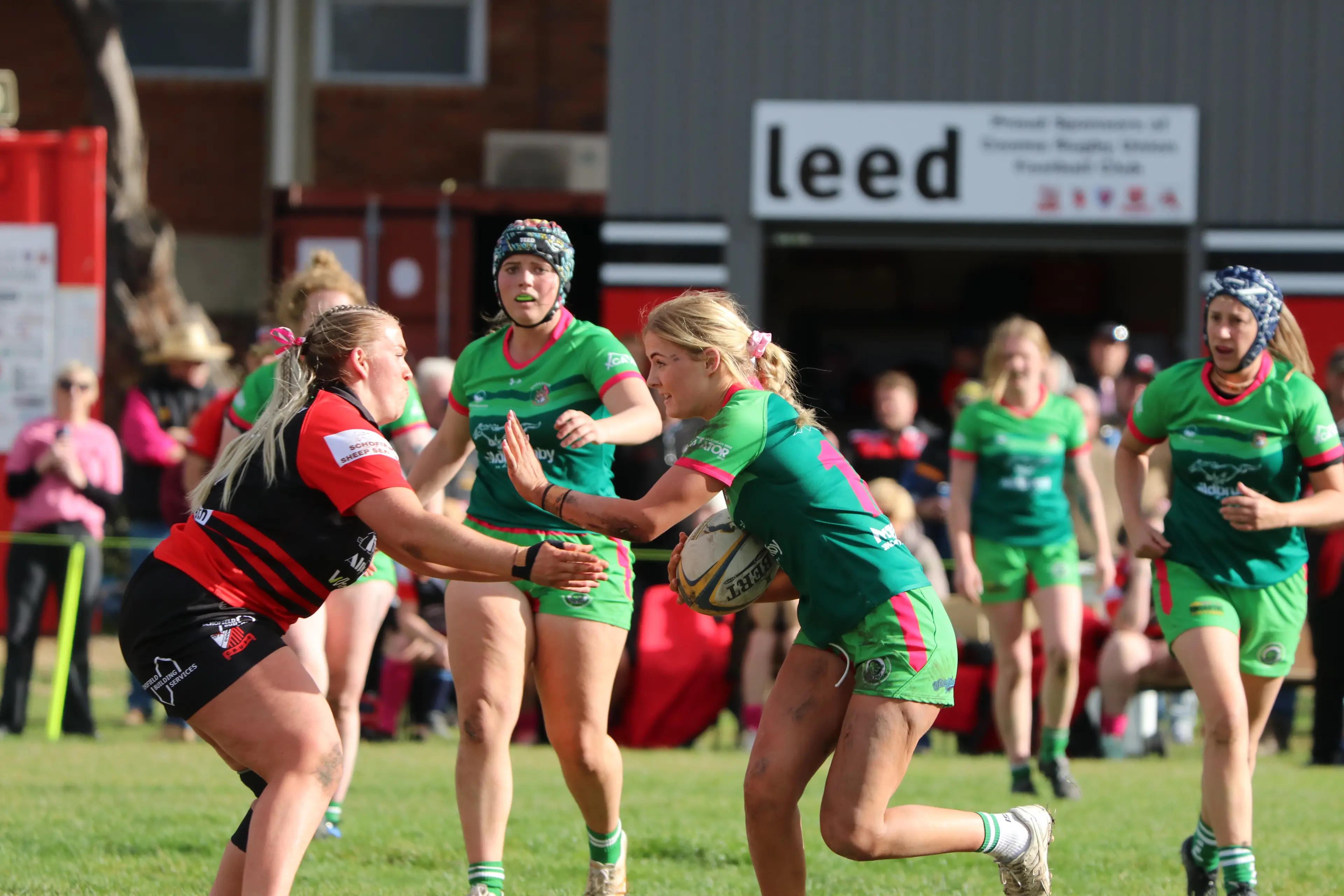 <p>TOUGH: Another exciting contest is played out between the Cooma Devils Angels and Jindabyne Miss Piggies. PHOTO: Nathan Thompson</p>\\n