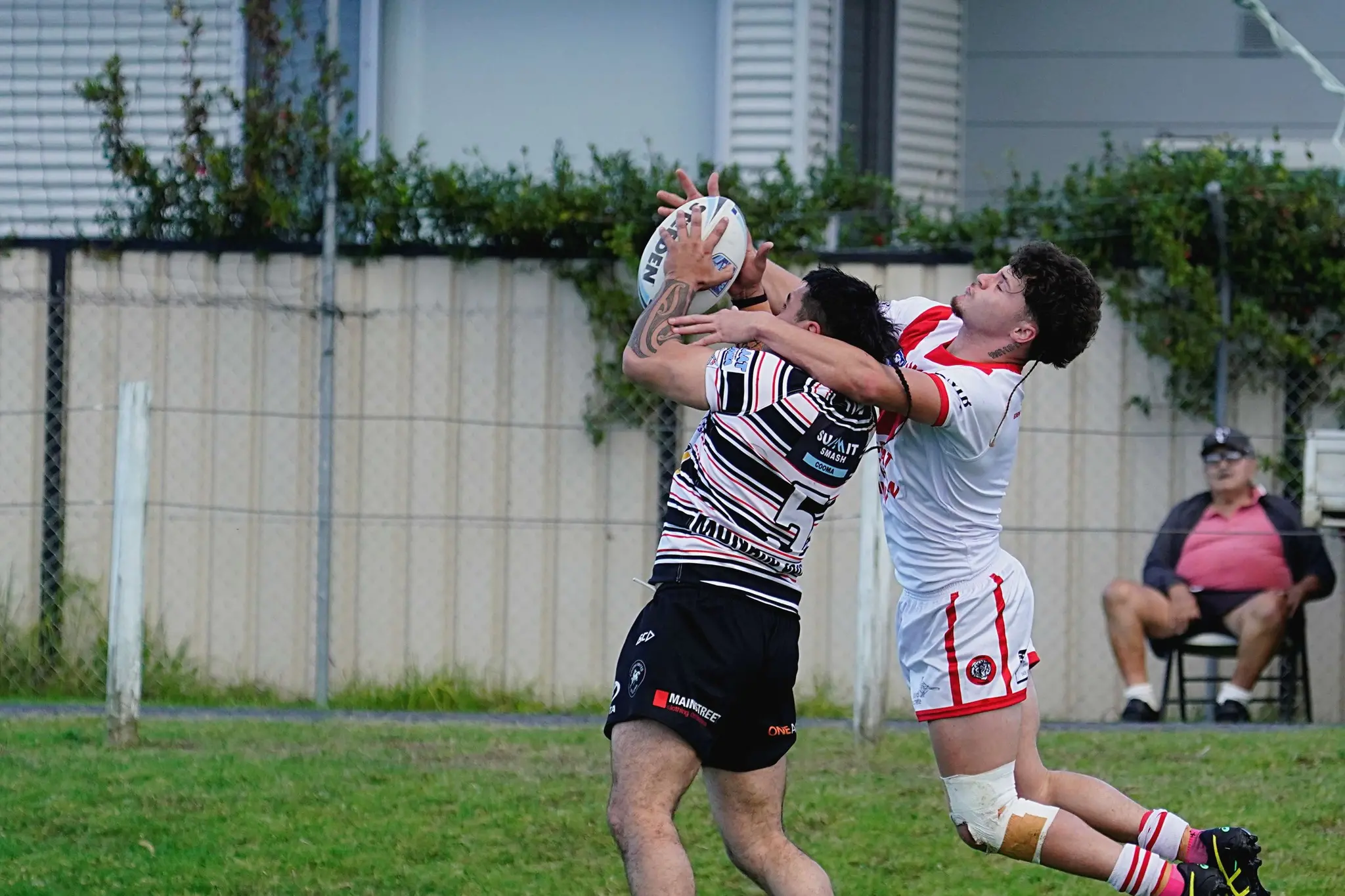 <p>GROUP 16: In the first grade clash, Stallions winger Jacob Haeata leaps for the ball. </p>\\n