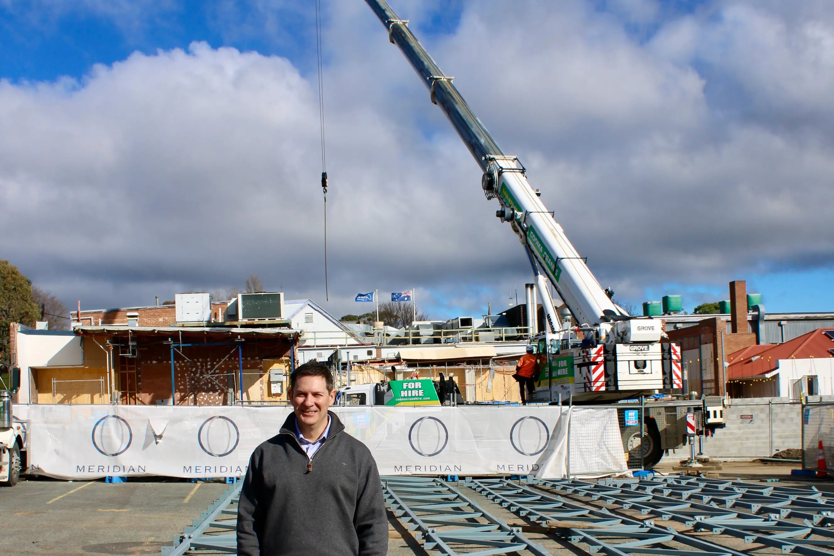 <p>UPDATE: Cooma Ex-services Club CEO, Kade Morrell, at the rear of the club, where the car park used to be, standing among the structural steel trusses that were installed last week. PHOTO: Melinda Cairns Hack</p>\\n