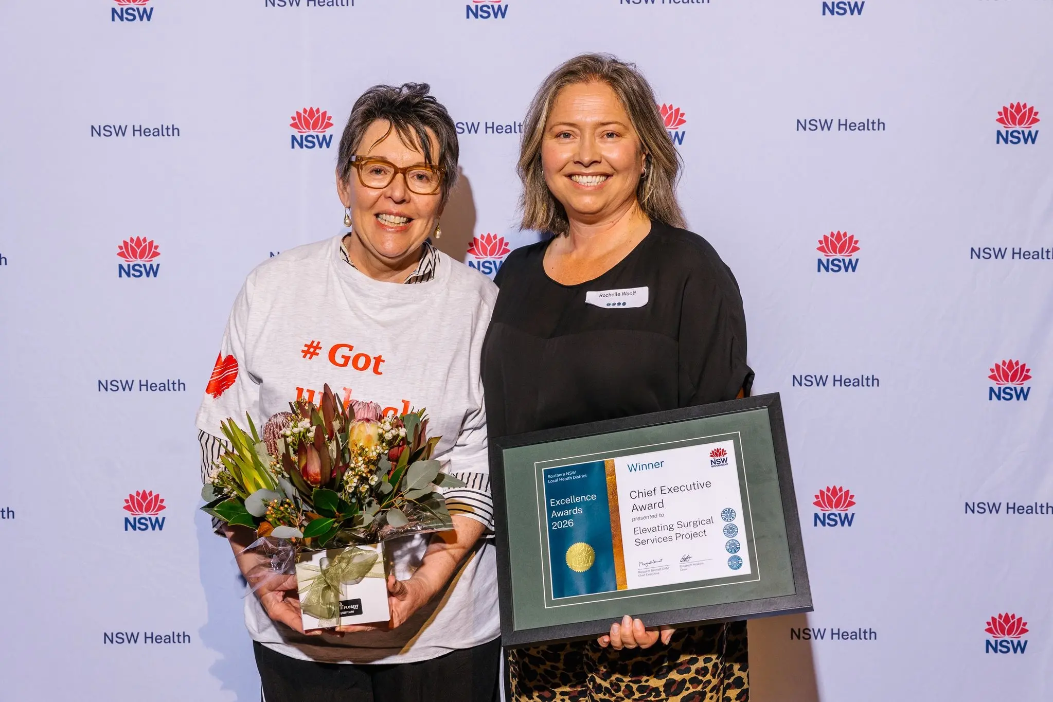 <p>RECOGNITION: Monica Alcock and Rochelle Woolf receive the Chief Executive\\u2019s Award for the \\u201CElevating Surgical Services project. PHOTO: Supplied</p>\\n
