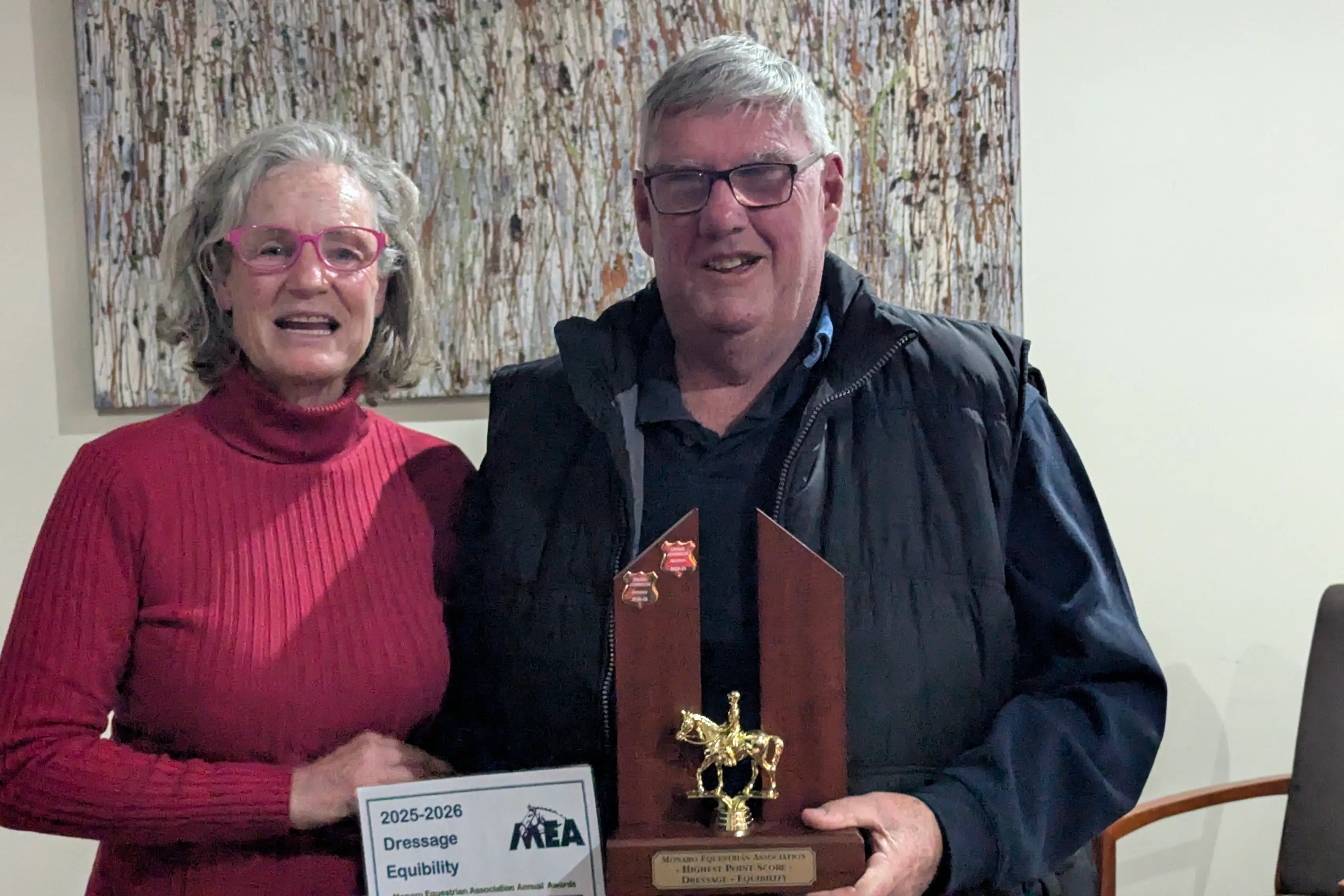 <p>RECOGNITION: Kim Kleven presents Craig Johnson, the winner of the equibility dressage award. PHOTO: Monaro Equestrian Association </p>\\n
